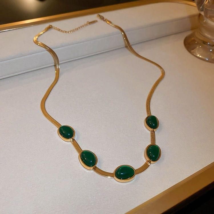 Emerald Glow™ Oval Green Stainless Crystal Pendant Necklace & Bracelet Set- Gold-Plated Elegance