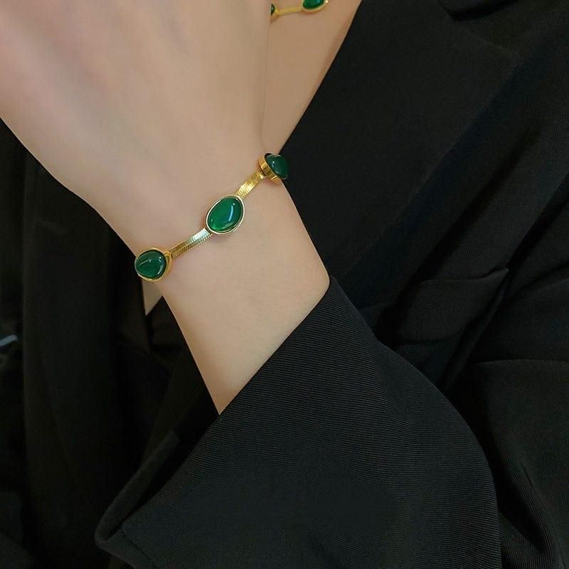 Emerald Glow™ Oval Green Stainless Crystal Pendant Necklace & Bracelet Set- Gold-Plated Elegance
