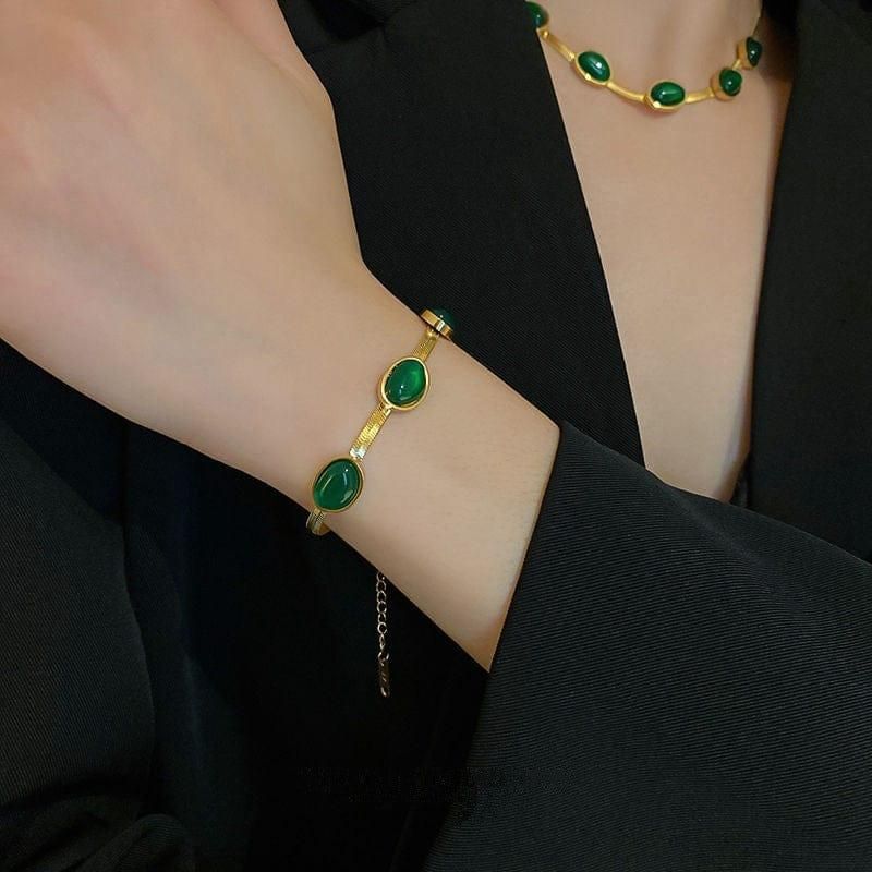 Emerald Glow™ Oval Green Stainless Crystal Pendant Necklace & Bracelet Set- Gold-Plated Elegance